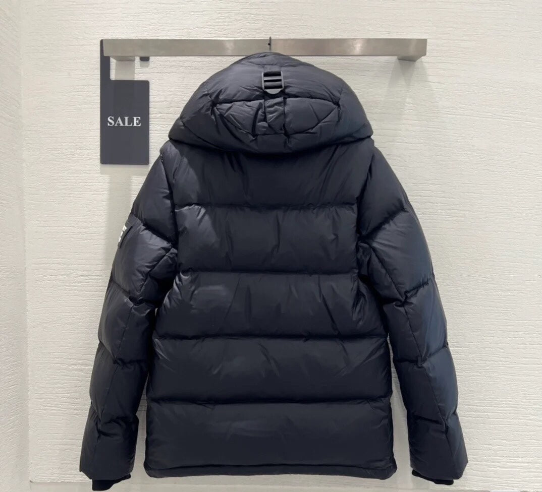 Burberry puffer jacket with raised collar, quilted dark back and full sleeves