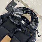 Burberry puffer jacket hood close-up with plaid lining and black interior, drawcord detail