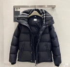 Burberry puffer jacket front view with plaid hood lining and buttoned placket, dark insulated