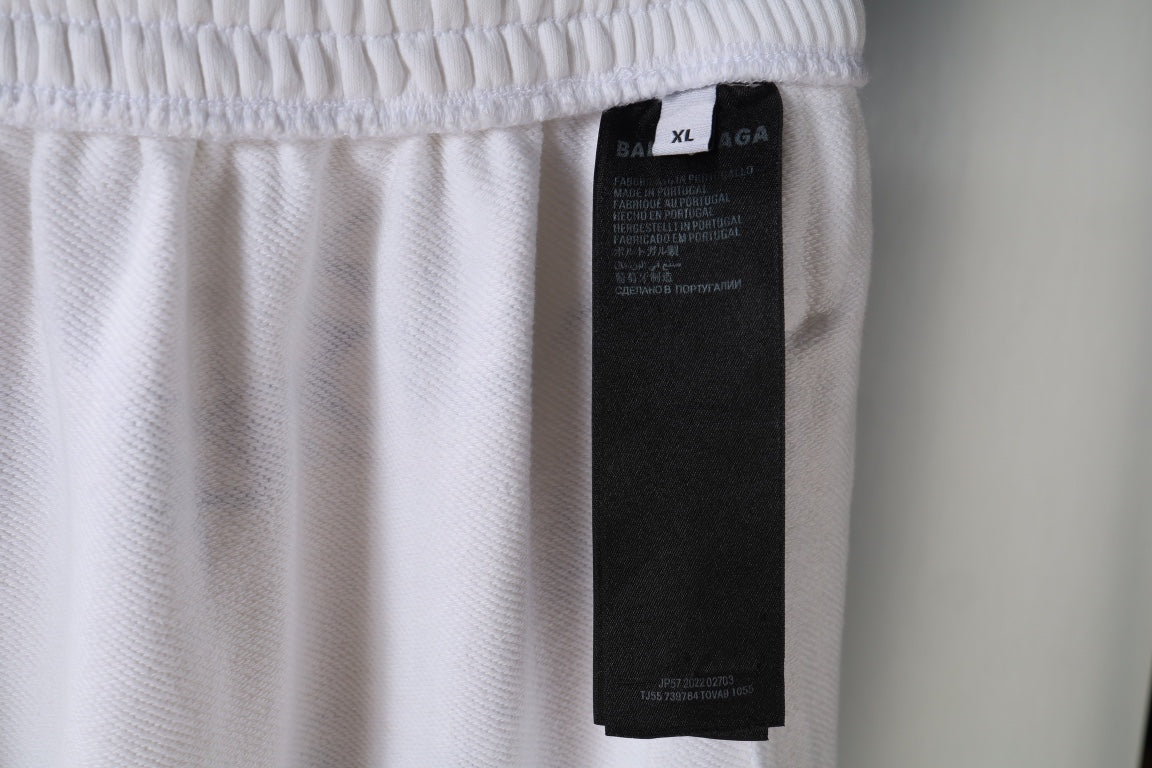 White pants with inside size tag and elastic waistband