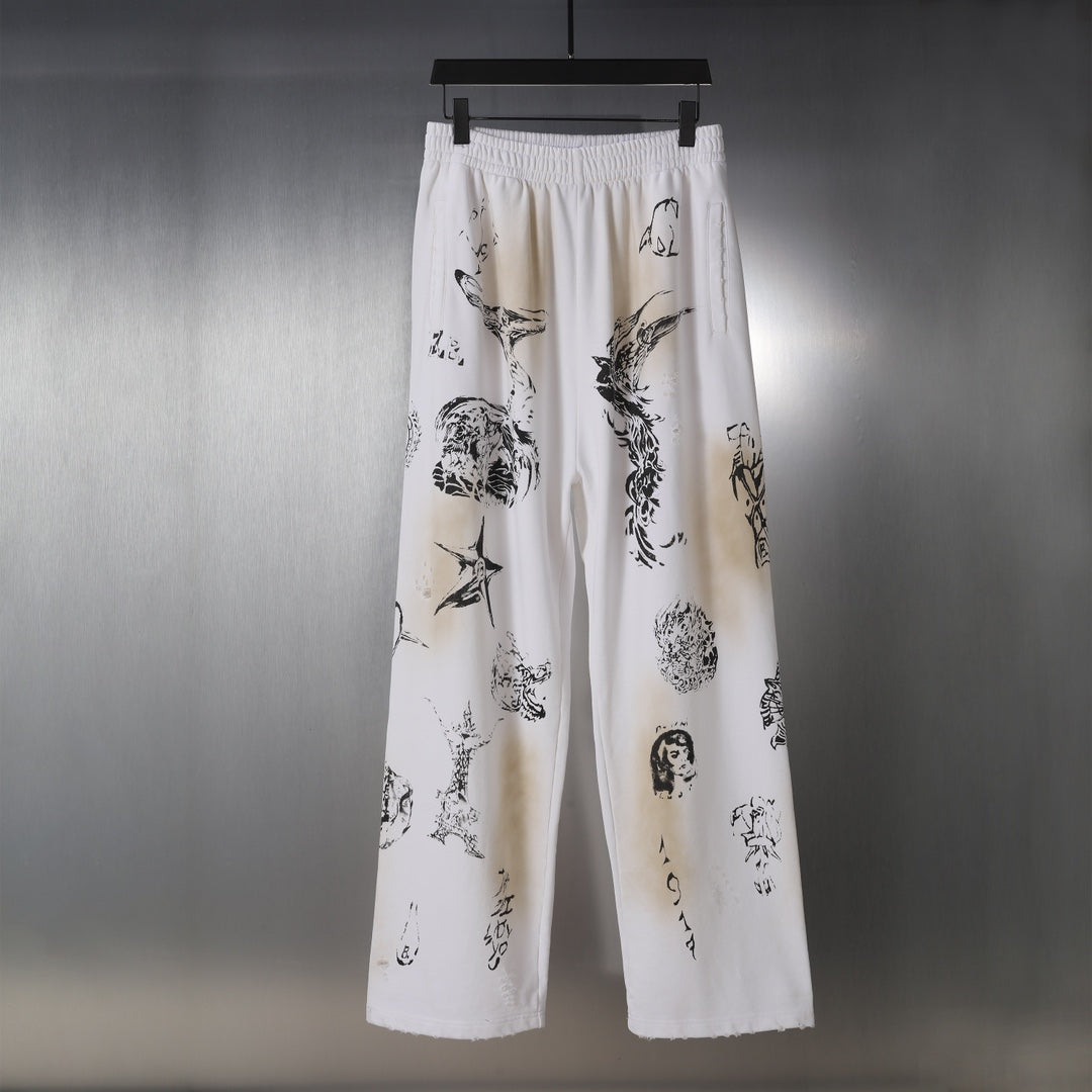 White graphic-print wide-leg pants with elastic waistband