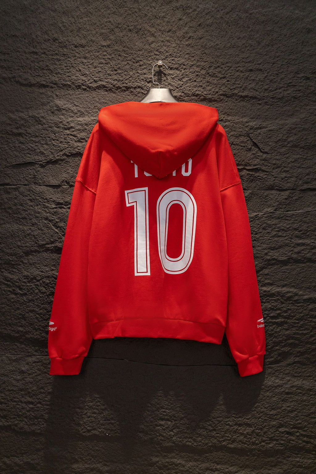 Red zip hoodie with hood, large '10' back graphic