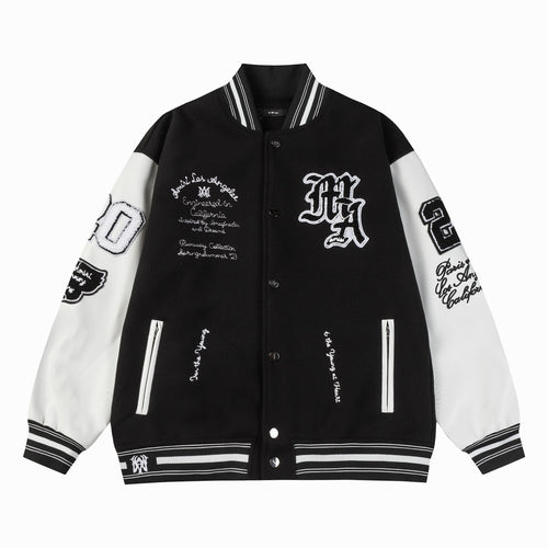 Black and white varsity jacket with snap buttons, ribbed collar, and striped cuffs
