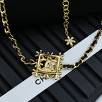 Gold-tone Chanel necklace with square CC medallion and star accents