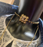 Gold-tone Chanel necklace with snowflake CC pendant on linked chain