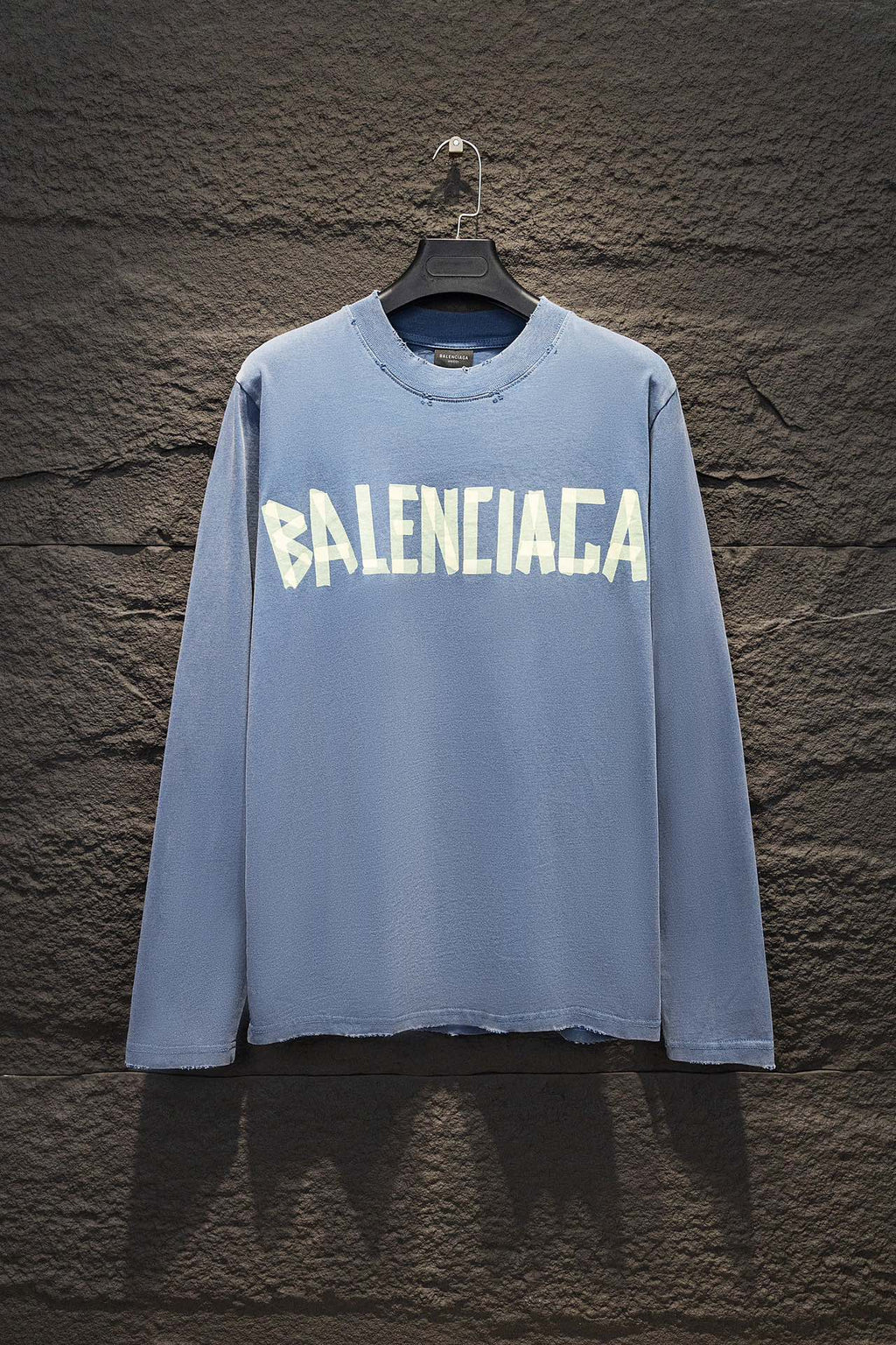 Light blue long-sleeve shirt with large Balenciaga logo print on the front