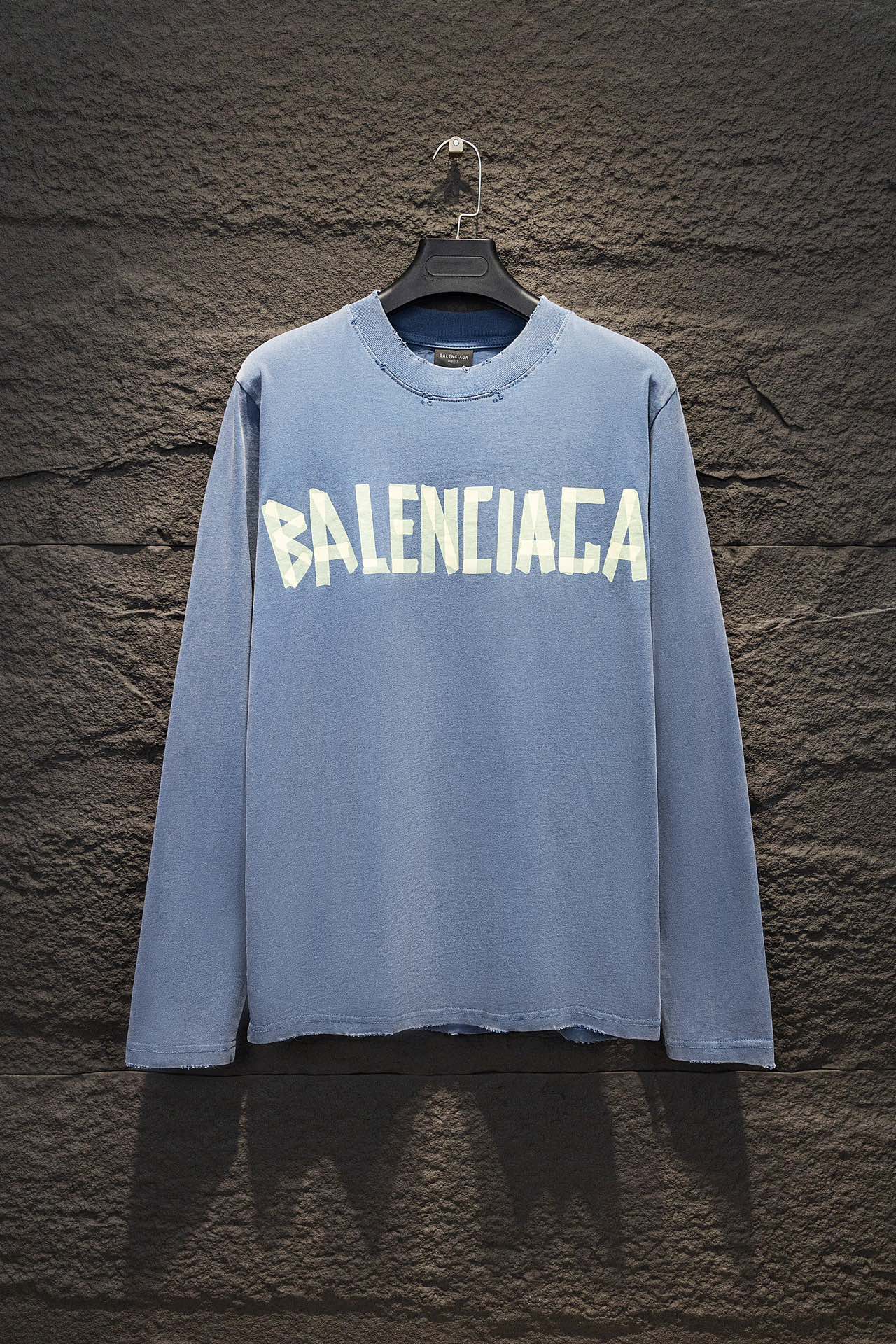 Light blue long-sleeve shirt with large Balenciaga logo print on the front