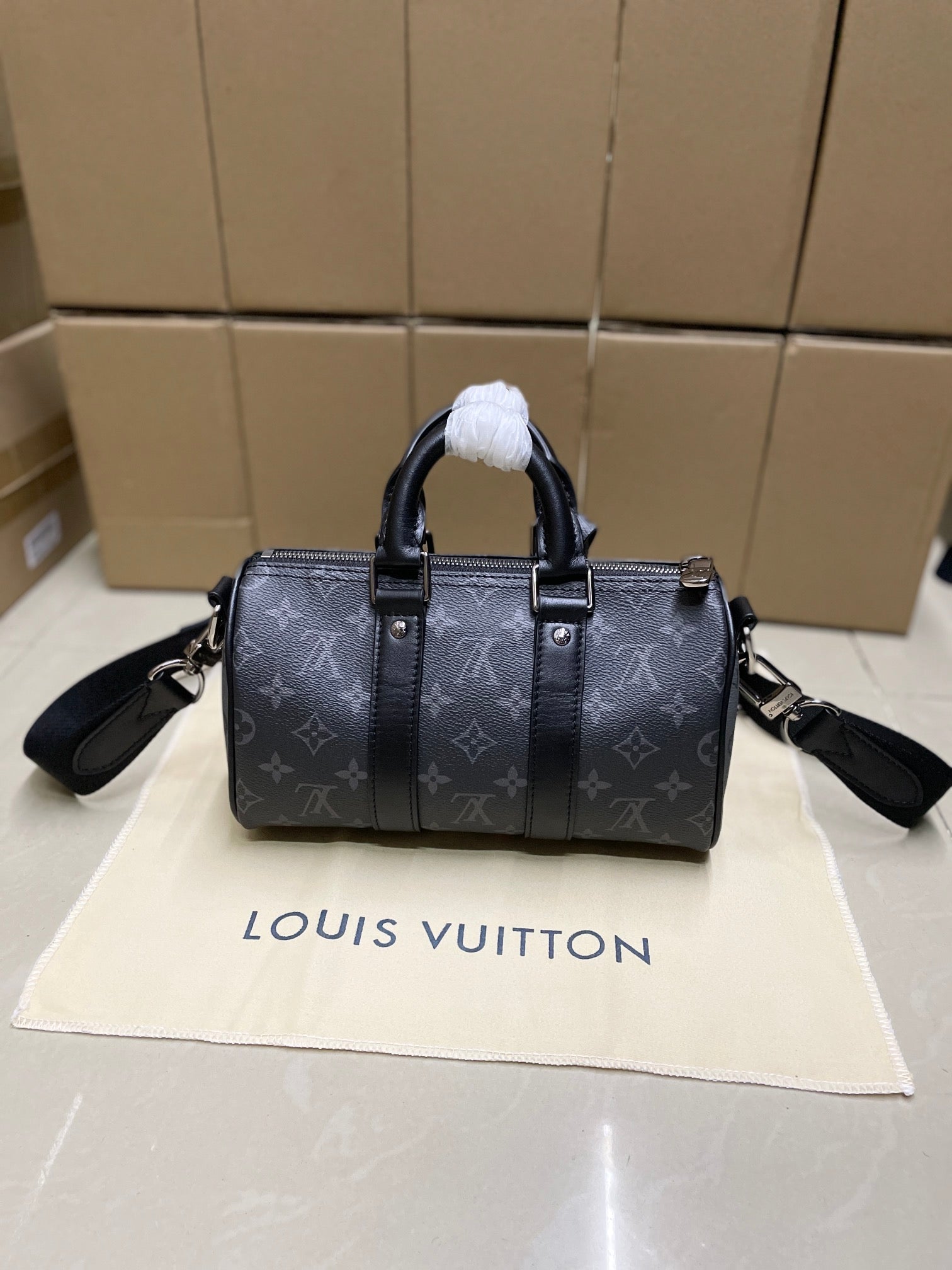 Louis Vuitton monogram satchel bag, dark gray, front view with shoulder straps