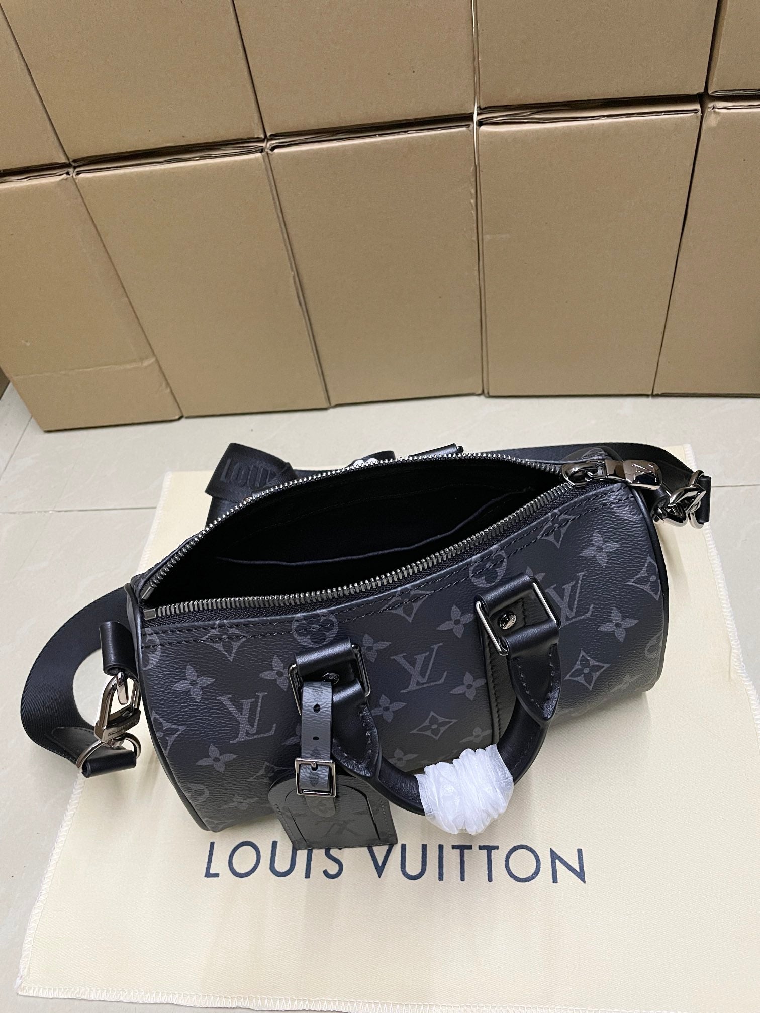 Louis Vuitton monogram satchel bag, dark gray, zipped top with crossbody strap