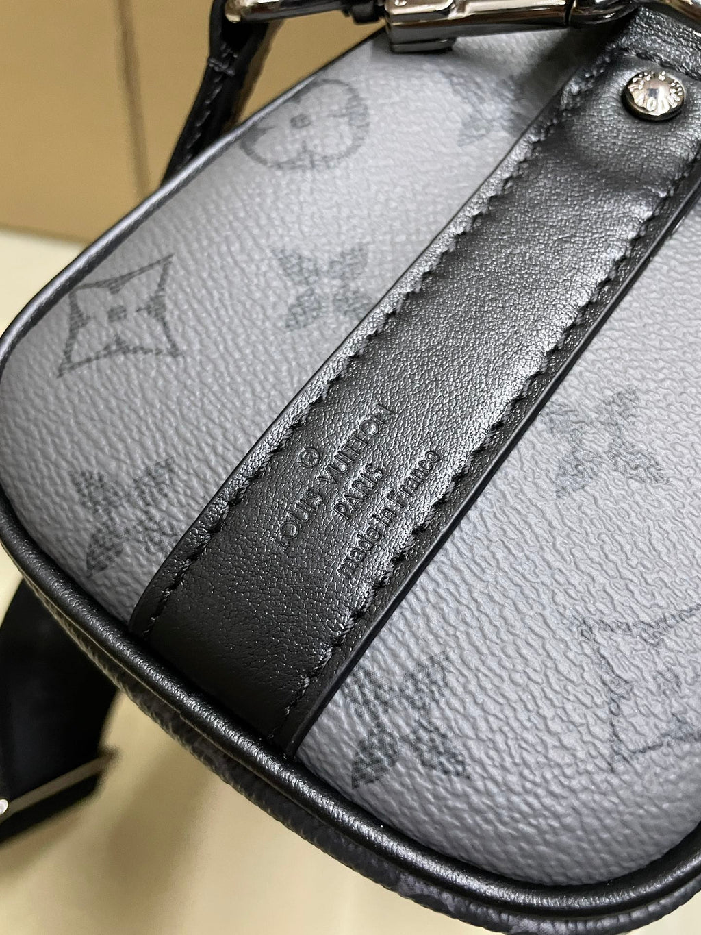 Louis Vuitton monogram satchel bag, dark gray, leather trim and embossed tag detail