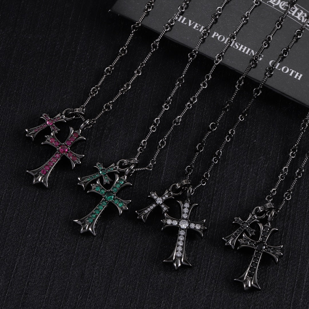 Cross pendant necklace set with silver-tone chains and pink/green accent stone crosses