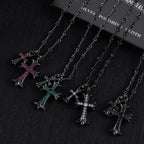 Cross pendant necklace set with silver-tone chains and pink/green accent stone crosses