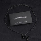 Chrome Hearts silver polishing cloth with two silver-tone cross pendant necklaces