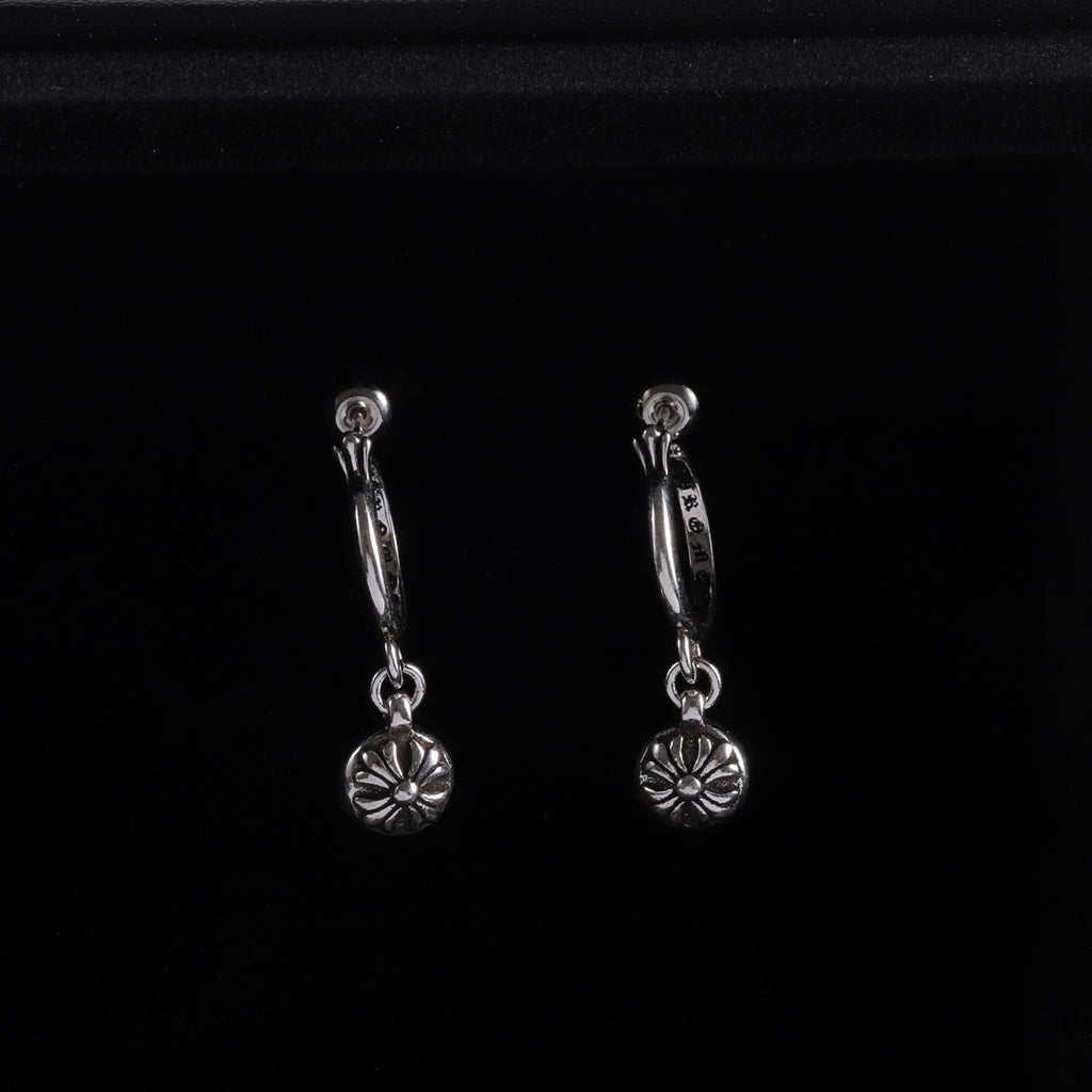 Silver hoop drop earrings with flower charms and linked chain details