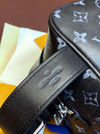 Louis Vuitton monogram bag front patch logo near zipper and top edge