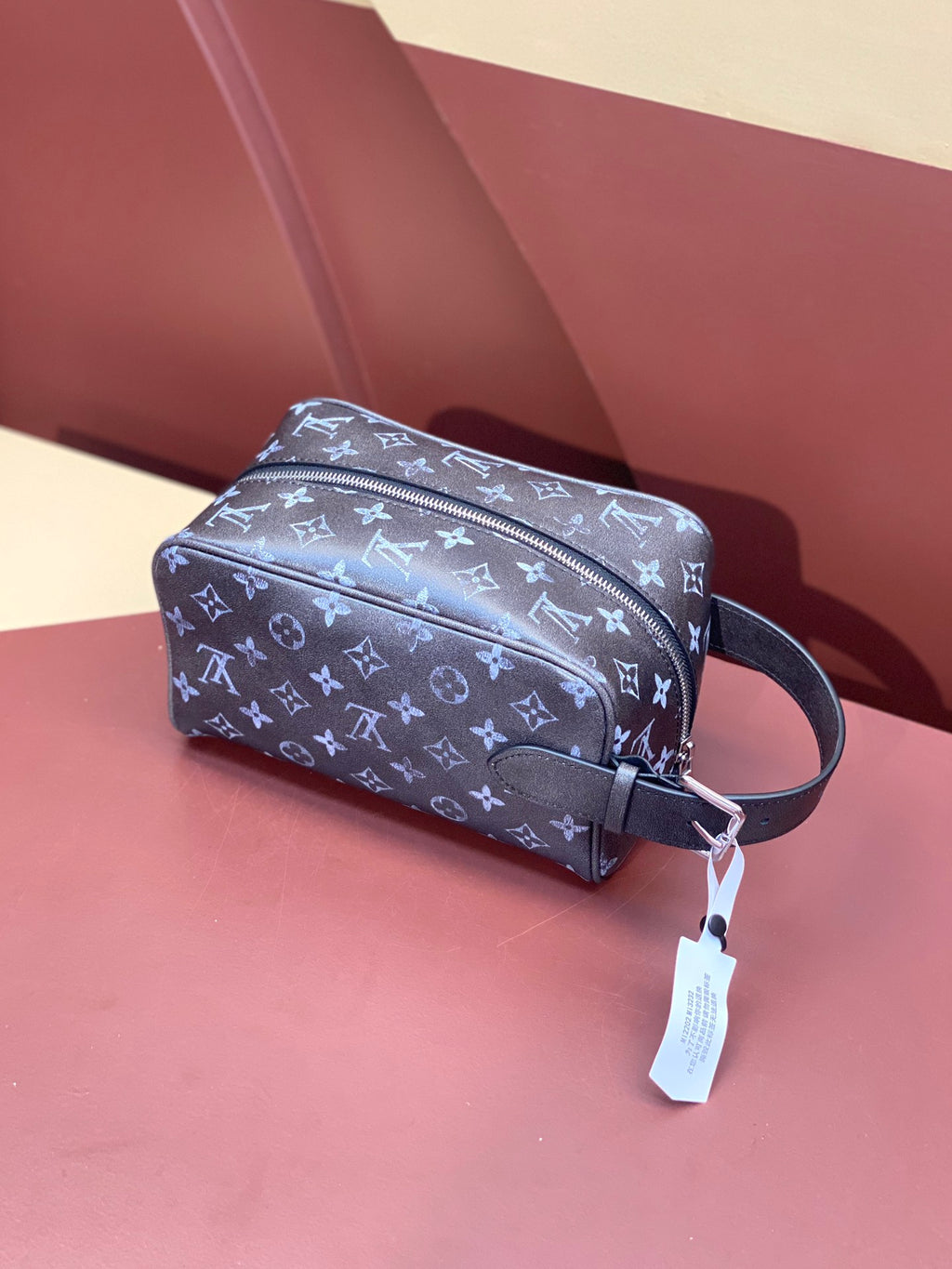 Louis Vuitton monogram zip pouch with adjustable strap and hanging tag