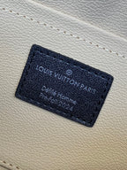 Louis Vuitton monogram bag interior leather label with printed text