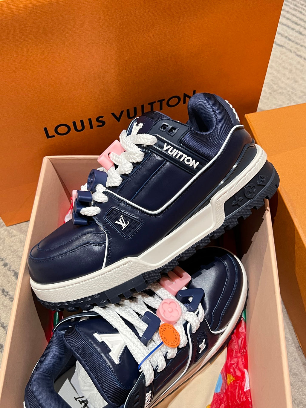 Louis Vuitton navy trainer sneakers with chunky sole and white lace trim