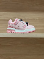 Pink low-top sneakers with white sole and light blue trim, lace-up design