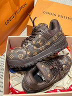 Louis Vuitton monogram trainer shoes in dark brown with black laces, front three-quarter view