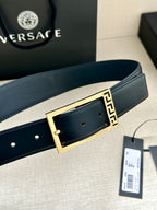 Navy leather belt with gold rectangle buckle and Greek key border