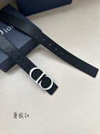 Dark blue Dior belt strap with pin holes and gold-tone CD buckle