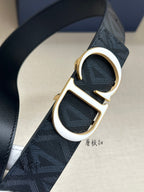 Dark blue Dior belt detail: gold-tone CD buckle on textured strap