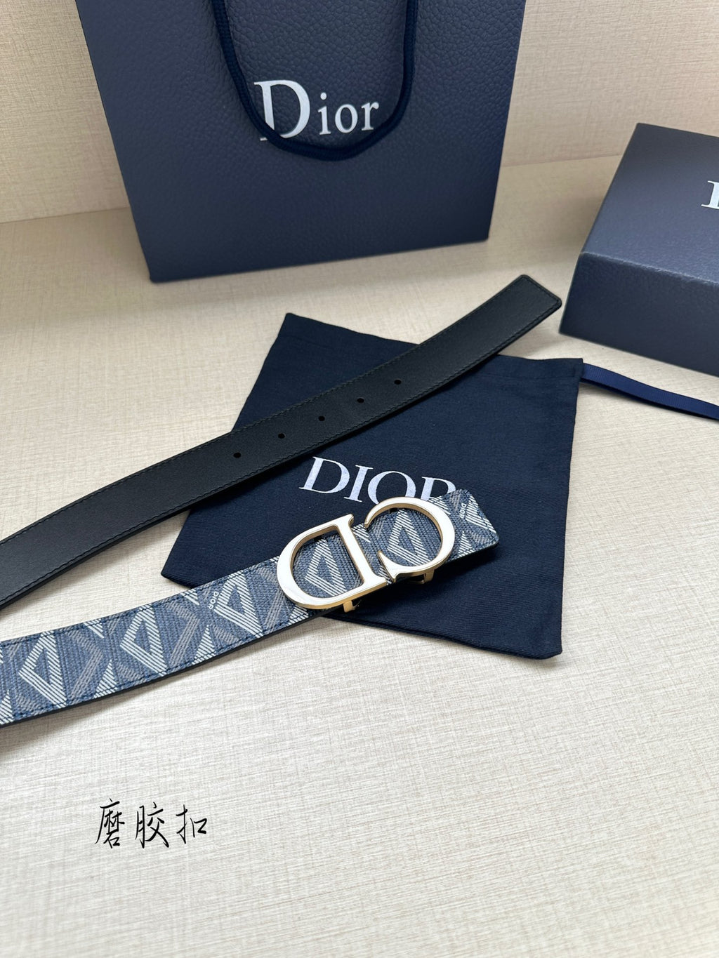 Dior belt with blue patterned strap and gold-toned CD buckle