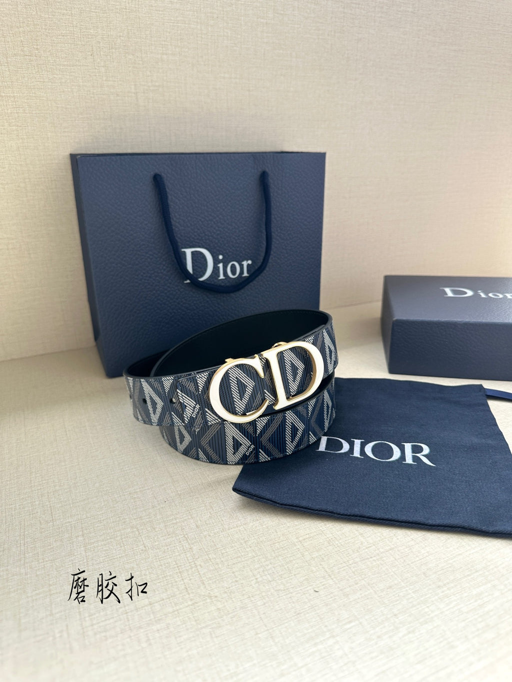 Dior belt with blue patterned strap and gold-toned CD buckle
