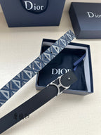Dior belt with blue patterned strap, silver CD buckle, and dark leather end