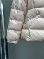 Moncler light pink puffer jacket sleeve with snap cuff and diagonal side zipper