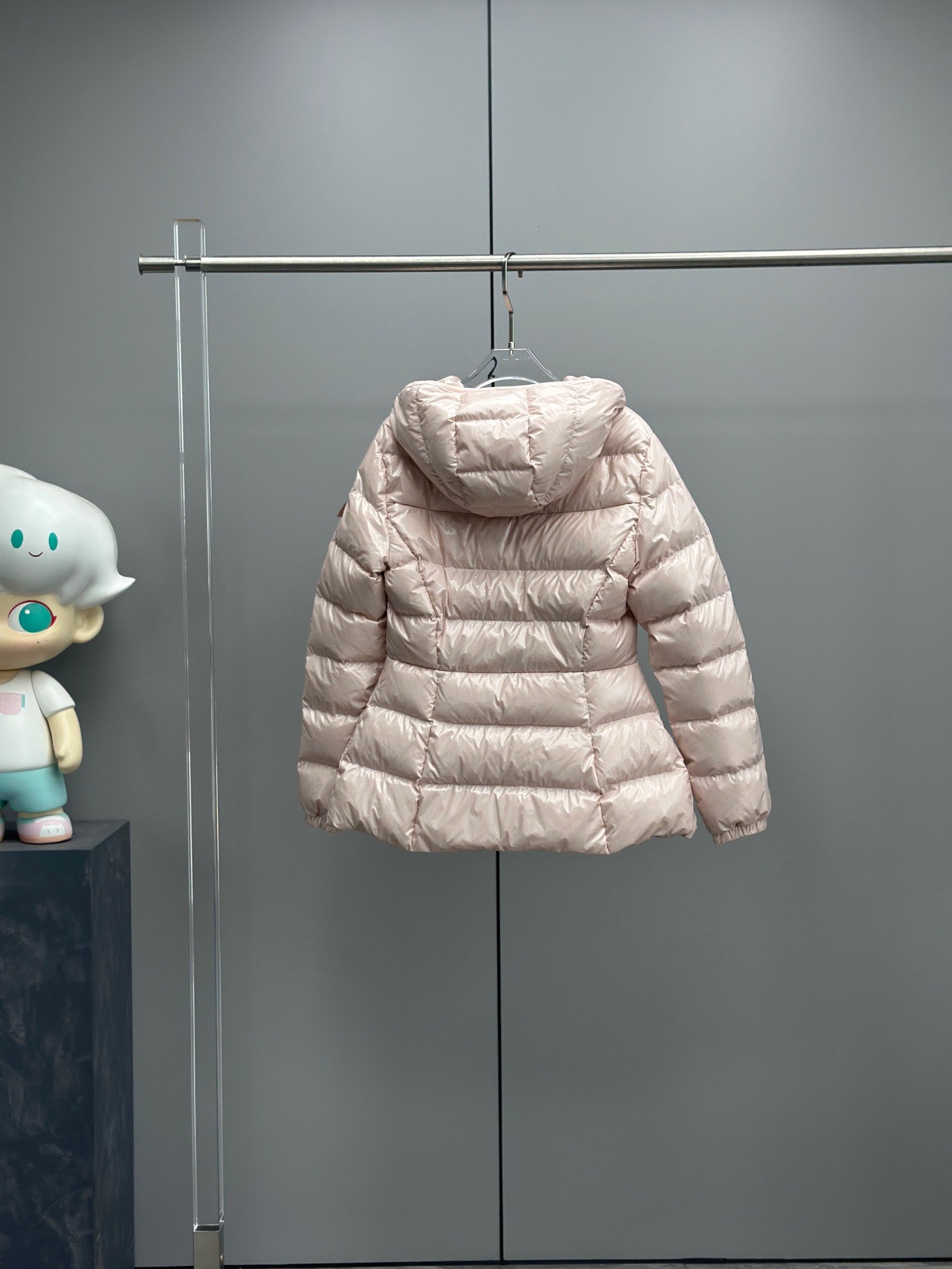 Moncler light pink hooded puffer jacket with quilted chevron-stitch design