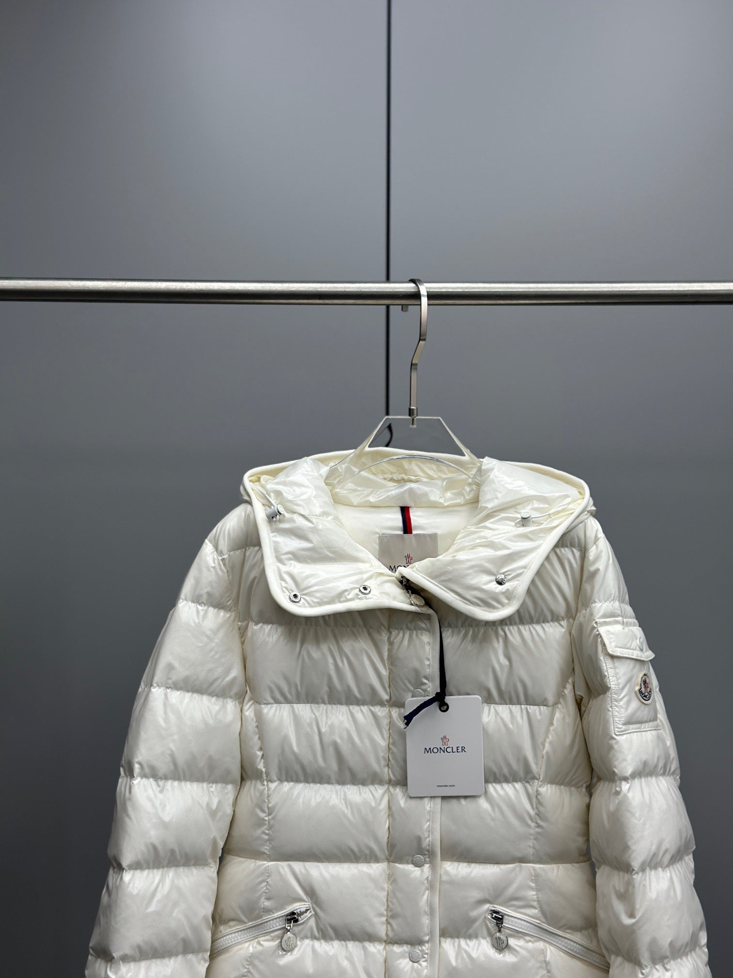 White long puffer jacket with hood, front zipper, Moncler chest logo