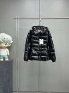Black shiny puffer jacket with hood and front zip, kids style
