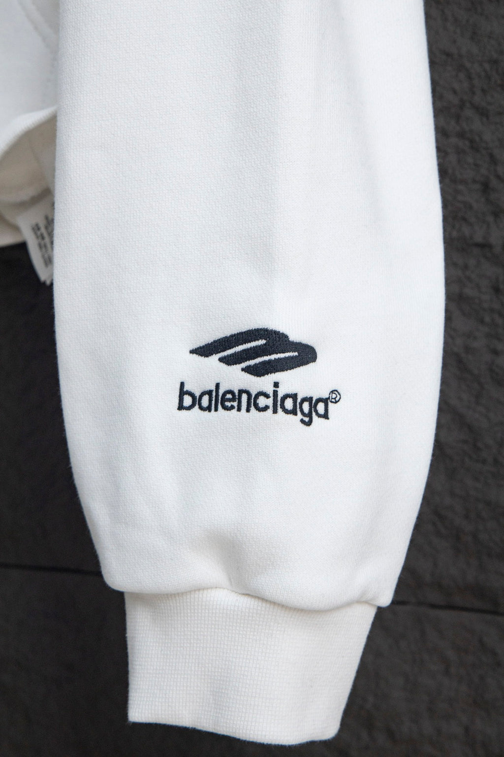 Balenciaga white zip-up hoodie sleeve logo detail