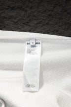 Balenciaga white hoodie size label on fabric