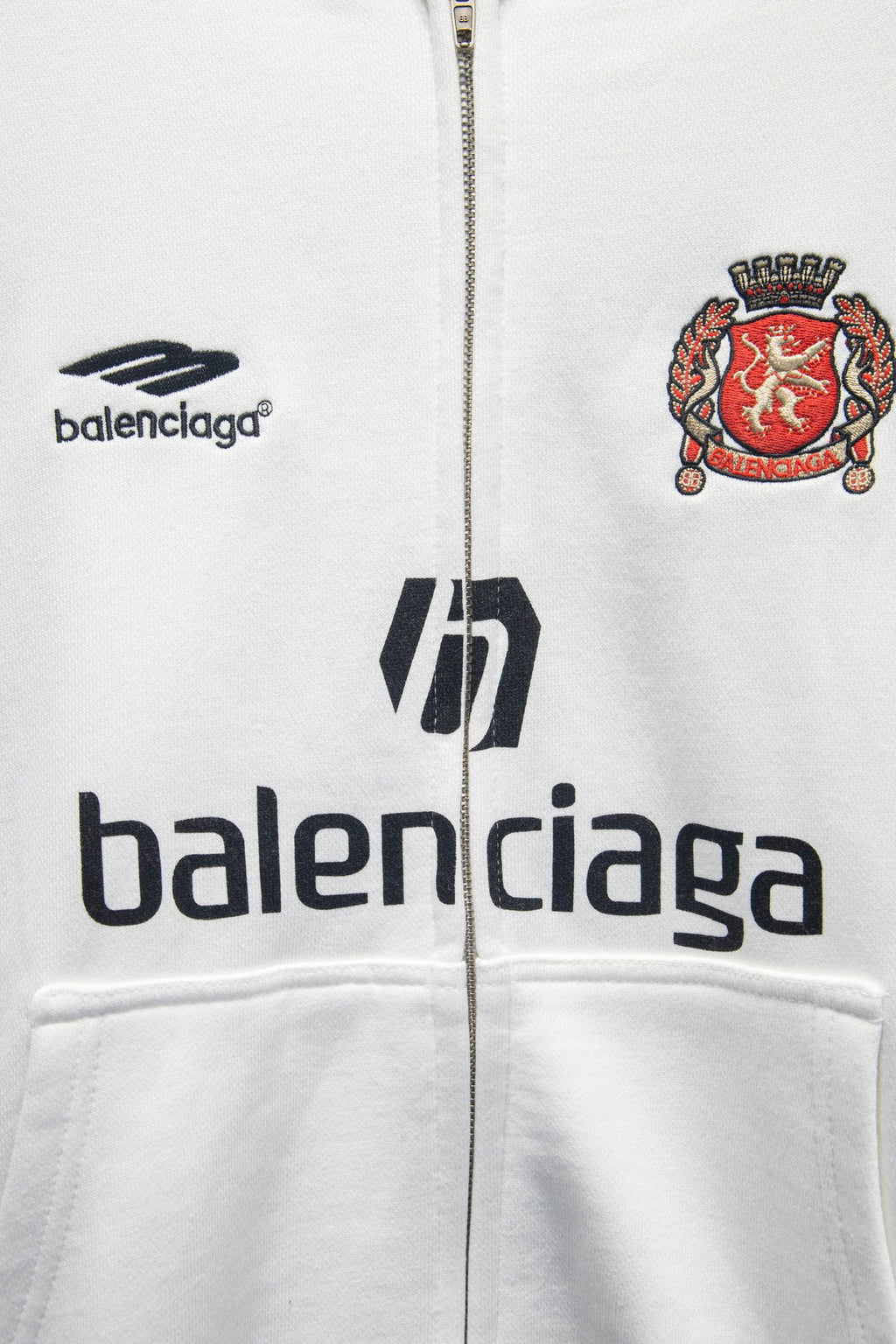 Balenciaga white zip-up hoodie front logos and crest patch