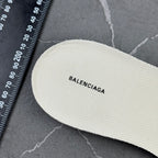 White sneaker insole with BALENCIAGA text, stitched edge