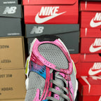 Unisex running shoe heel, gray mesh with pink leather panel and lace-up strap