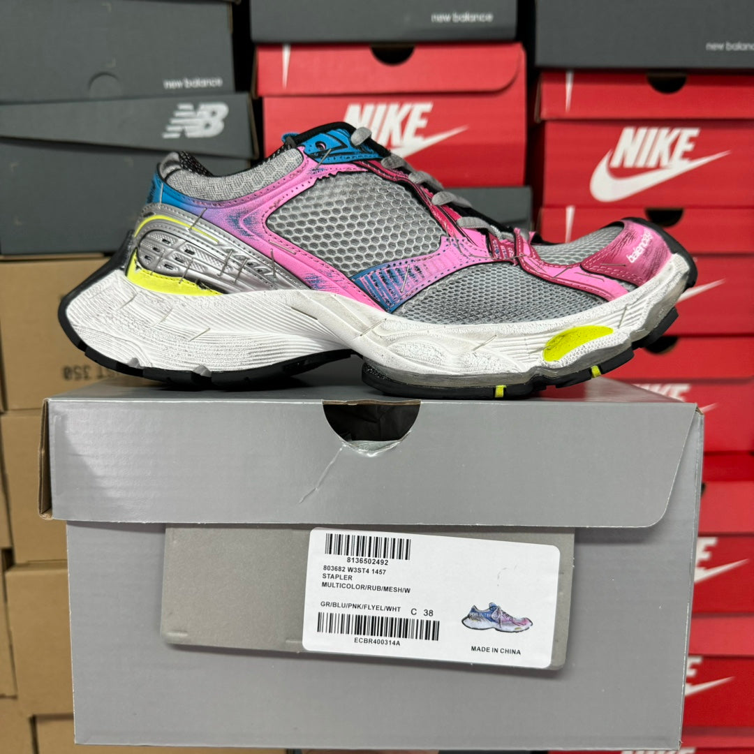 Unisex running shoe, gray mesh with bright pink upper, blue laces, and yellow details