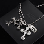 Silver-tone cross charm necklace with cross centerpiece and dog-tag style charms