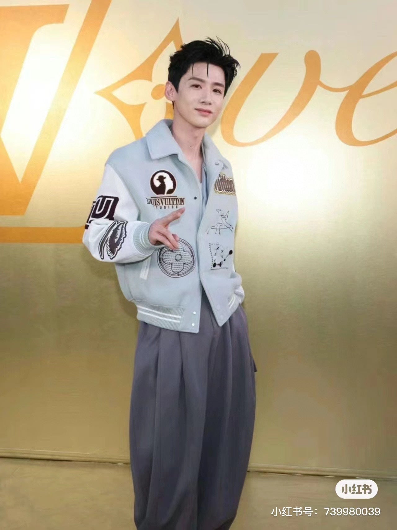 Louis Vuitton long-sleeve jacket in light blue with chest patch and button placket