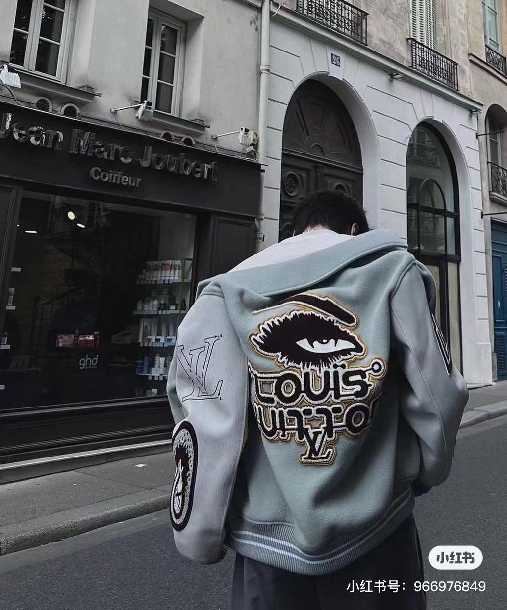 Louis Vuitton long-sleeve jacket with bold back logo and embroidered patches