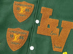Green Louis Vuitton jacket with shield patches and snap button placket