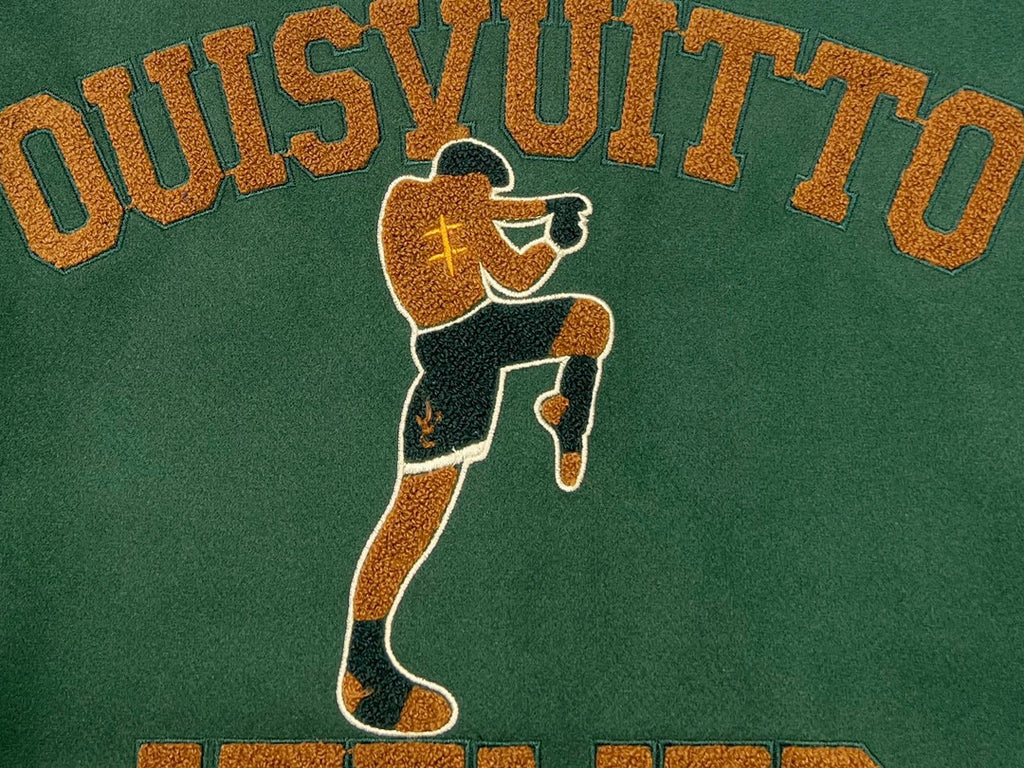 Green Louis Vuitton jacket with large embroidered athlete graphic