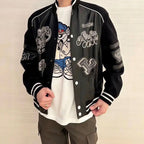 Louis Vuitton leather-look varsity jacket on model, button front and sleeve graphic detail