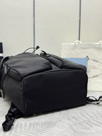 Prada black nylon duffel-style bag with side zip and strap handles