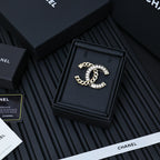 Gold-tone chain bracelet with rhinestone interlocking C clasp detail