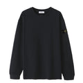 Black long-sleeve crewneck top with small side logo patch