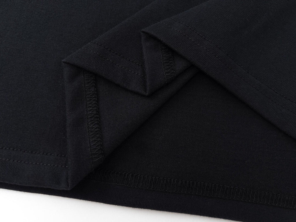 Stone Island dark garment hem and side seam detail